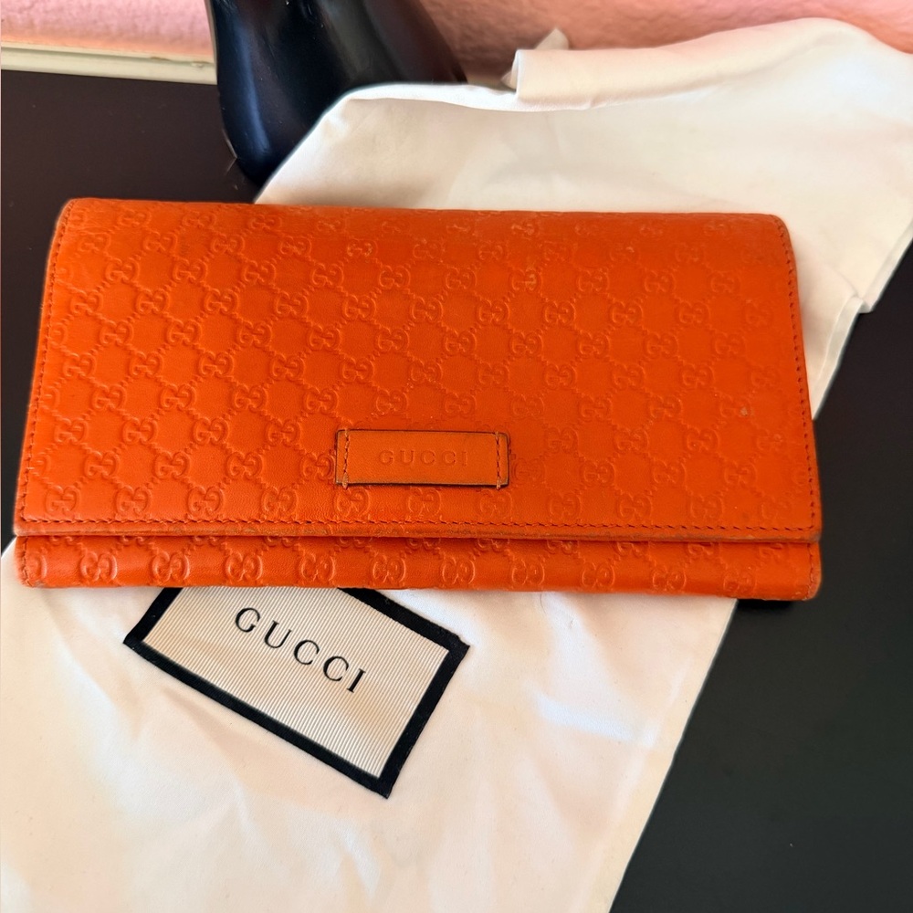 Authentic Gucci Vibrant Orange Leather Wallet.